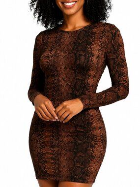 NWT small form fitting dress. Snake skin dress. Long sleeve dress Glam Dressy
